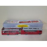 A boxed Dinky supertoys car carrier with trailer no 983 some small chips to paintwork but