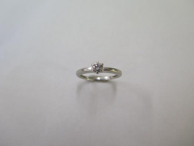 A platinum 950 diamond solitaire ring, size L, approx 3.2 grams, diamond approx 0.20ct, some usage