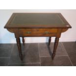 An Edwardian mahogany side table with a leather insert top and a frieze drawer, 78cm tall x 92cm x
