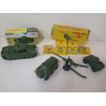 Dinky Toys four military diecast items, Centurion tank, medium gun, personnel carrier and armoured