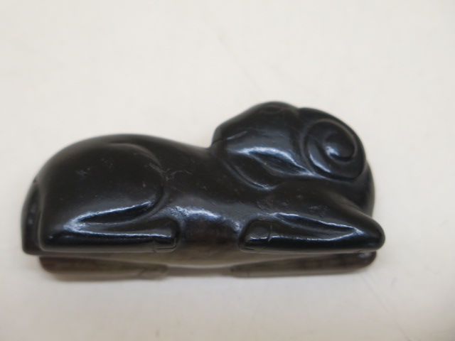 A carved jade ram, 6cm x 2.5cm, in good condition