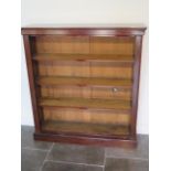 A Victorian mahogany open bookcase with three adjustable shelves in good condition, 129cm tall x