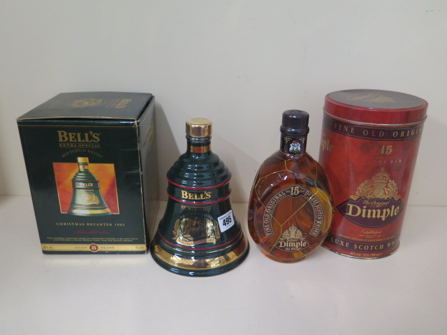 A 15 year old Dimple bottle of Deluxe Scotch whisky 70cl, and a Bells 1995 70cl Bell of Extra