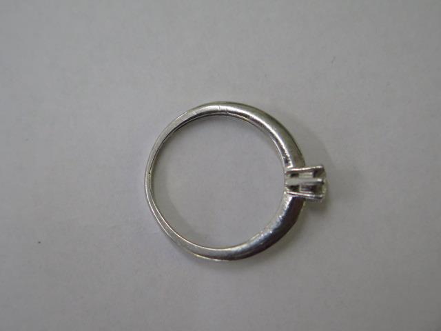 A platinum 950 diamond solitaire ring, size L, approx 3.2 grams, diamond approx 0.20ct, some usage - Image 4 of 4