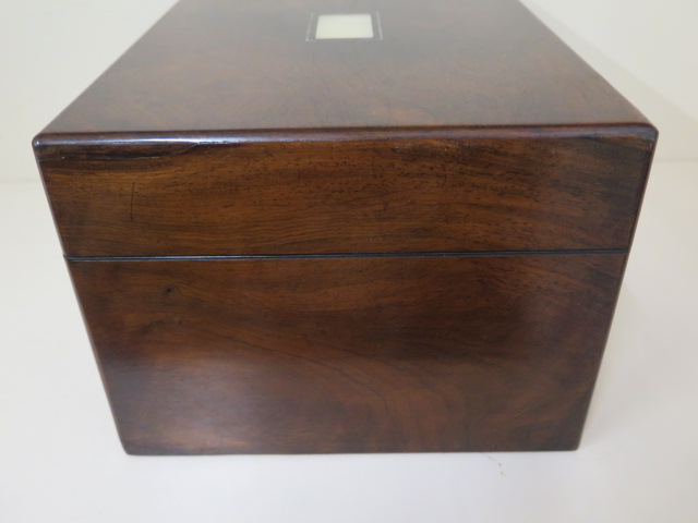 A Victorian walnut travel box with a fitted interior containing nine bottles and tidies with - Image 8 of 8