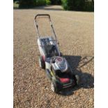 An AI-KO silver 520 BR petrol lawn mower with a Briggs and Stratton 650E series ready start 190cc