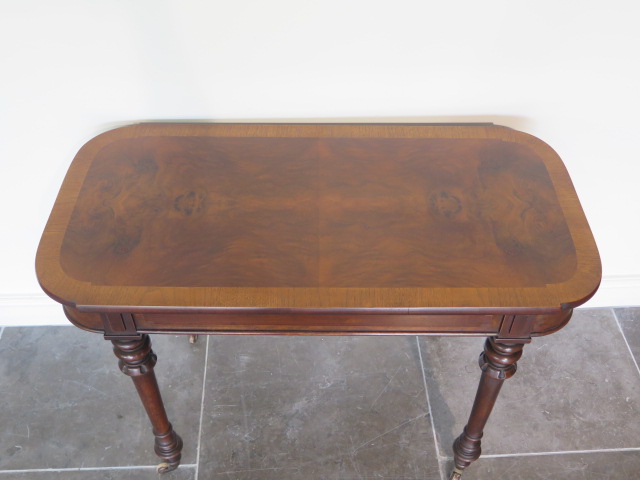 A walnut centre table on turned legs, stamped Willis & Cheal Buchers St Glasgow no 11512, 73cm - Image 2 of 4