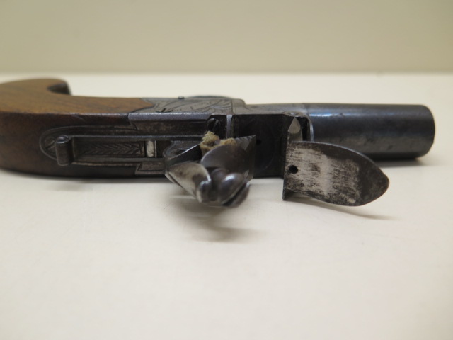 An 1800's box lock flintlock pistol by Boston of Wakefield, 16cm long, generally good, cocks and - Image 4 of 4