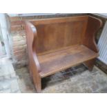 An oak settle hall bench, 100cm tall x 118cm x 49cm