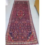 A rich blue ground full pile Persian hand woven Serouk woollen runner, 290cm x 112cm, in good