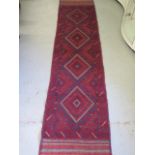 A hand knotted woollen Meshwani runner, 246cm x 60cm