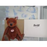 A Steiff Ralph the bear, 22cm tall, Limited Edition number 523 of 2010, boxed with outer box and