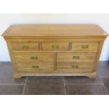 An Oak 7 drawer sideboard 77 cm tall 138 by 43 cm some stains to top otherwise generally good con