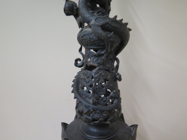 An Oriental bronze lamp with two temple dogs supporting a ball and lotus with an entwined dragon, - Image 4 of 8