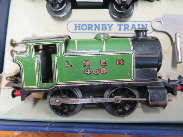 A boxed Hornby 0 gauge number 101 tank passenger clockwork train set, some wear but running with key - Image 3 of 3