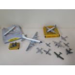 Three boxed Dinky toys aircraft and 9 other Dinky toys aircraft, all have some marks but all