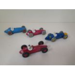 Four Dinky toy diecast racing cars, all original some small marks