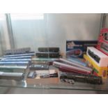 A collection of French Hornby Acho model railway including 11 boxed coaches and a loco, and other HO