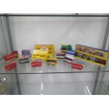 A collection of 14 Matchbox and Mayfield Crafts vehicles including a Fruehauf Hopper train, all