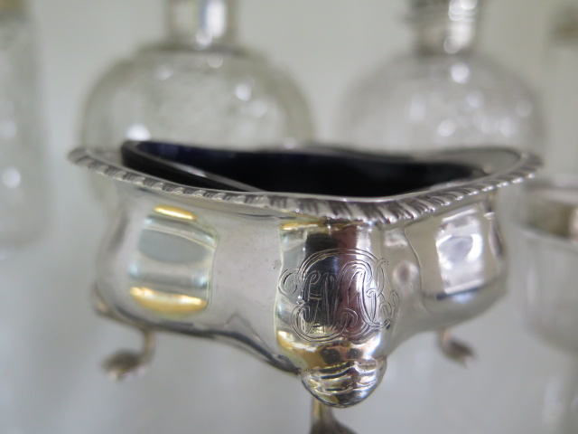 Four silver top bottles, a silver plated powder bottle, two silver rim glass salts, a silver - Image 2 of 5