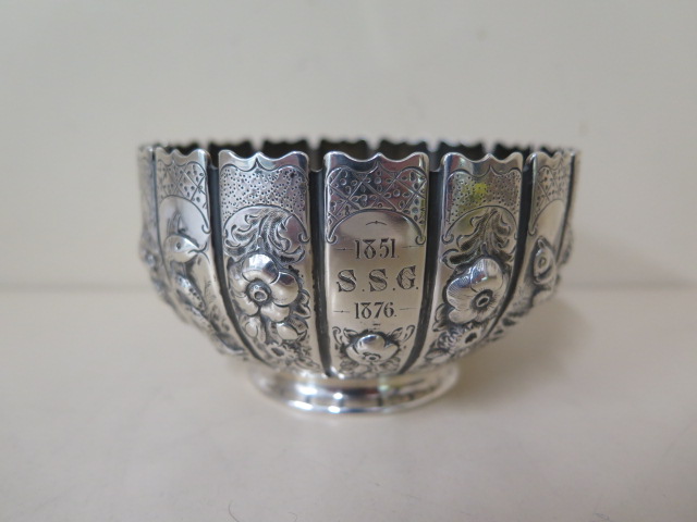 A Victorian silver Chinese style embossed bowl, 6cm tall x 10cm, London 1875/76, maker FDT