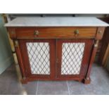 A mahogany marble top cabinet with a frieze drawer above two grill work doors, 91cm tall x 107cm x