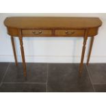 A new maple D shaped 2 drawer hall table on turned legs made by a local craftsman to a high