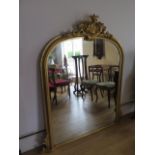 An ornate gilt Victorian style over mantle mirror, 154cm tall x 136cm wide, in good condition