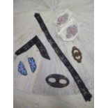 Two pairs of beaded epaulettes, two jet collars and two bead work buckles, some losses to long jet