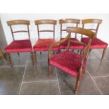 A set of five 19th century mahogany dining chairs with rope twist backs on turned front legs