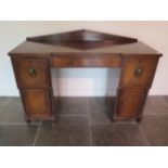 A 19th century mahogany twin pedestal sideboard with three drawers and two cupboard doors, 104cm