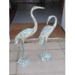 A pair of decorative metal verdi gris effect Herons, tallest 95cm