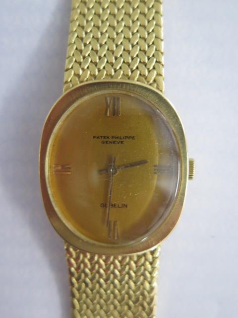 A Patek Philippe 18ct yellow gold mid size 1972 manual wind bracelet watch 23.300 calibre 18 rubis - Image 9 of 10