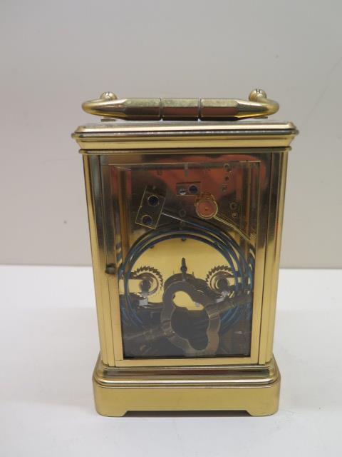 A brass French carriage clock strikes hours and half hours, 8 day movement, 15cm tall, in running - Image 3 of 3