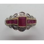 A 9ct yellow gold Art Deco style ruby and diamond ring, size L 1/2, hallmarked, approx 2.8 grams,