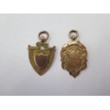 Two 9ct hallmarked gold fobs, approx 9.7 grams
