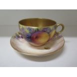 A G Delaney fruit decorated tea cup and saucer, both signed, 7.5cm tall x 16cm diameter, some