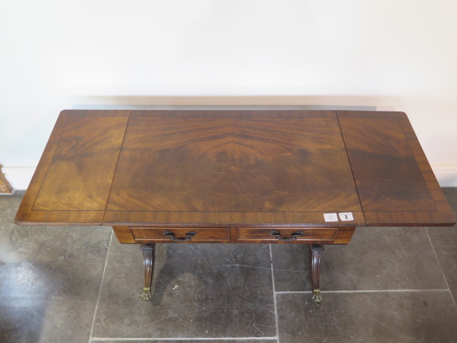 A mahogany dropleaf coffee table with two small drawers, 51cm tall x 129cm extended by 41cm - Image 2 of 2