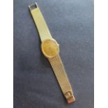 A Patek Philippe 18ct yellow gold mid size 1972 manual wind bracelet watch 23.300 calibre 18 rubis
