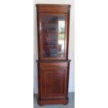 An Edwardian glazed corner cupboard in two parts, 185cm tall x 65cm wide, in good condition