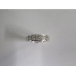 A hallmarked 18ct white gold five stone square cut diamond ring, approx 1.0ct of diamonds, size N/O,