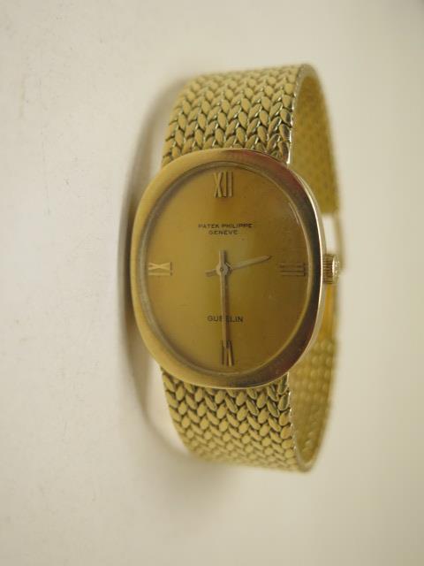 A Patek Philippe 18ct yellow gold mid size 1972 manual wind bracelet watch 23.300 calibre 18 rubis - Image 4 of 10