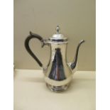 A Victorian silver coffee pot, London 1883/84, approx 18.5 troy oz, 23cm tall, engraving to both