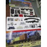 An unused 00 Hornby The Blue Highlander train set and a used Hornby 00 gauge Midland Belle train set