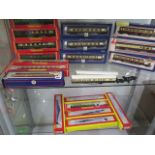 19 boxed 00 gauge Hornby, Bachmann and Lima railway coaches and 2 loose carriages