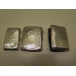 Three silver cigarette cases, one catch missing, all have some dents, total weight approx 5.6 troy