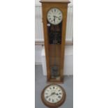 A Synchronome electric Master clock in an oak case numbered 26714 to dial, 6 1/2 inch dial signed