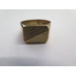 A hallmarked 9ct yellow gold signet ring, size T, approx 8 grams, some usage marks but generally