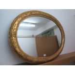 An oval 19th gilt framed mirror with later glass, 78cm x 100cm, frame has been regilded