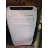 A Climachill portable air conditioner model PAC 12K, in working order with remote control